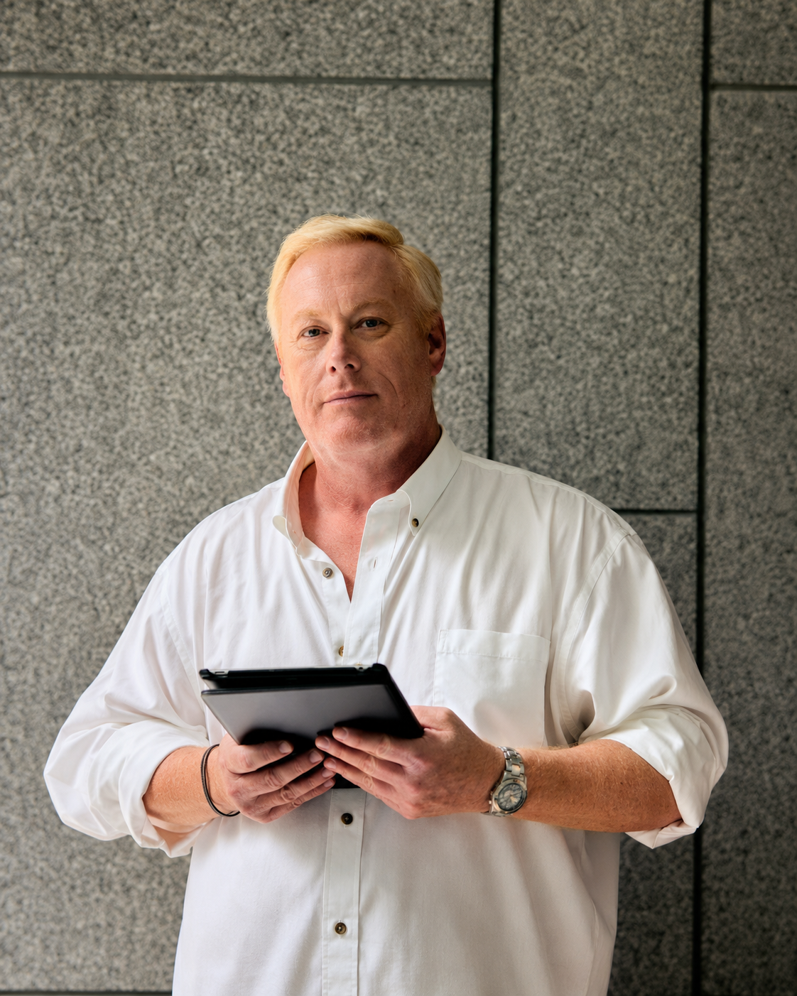 Nickolas Harold Potter reviewing material on a tablet